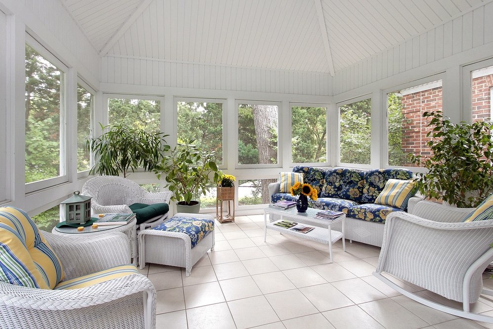 How to winterize a screened-in porch with couch and white tile floor image