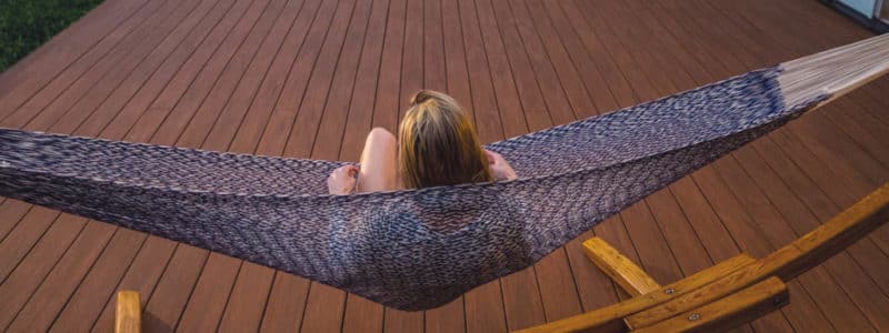 Woman in hammock on TimberTech deck