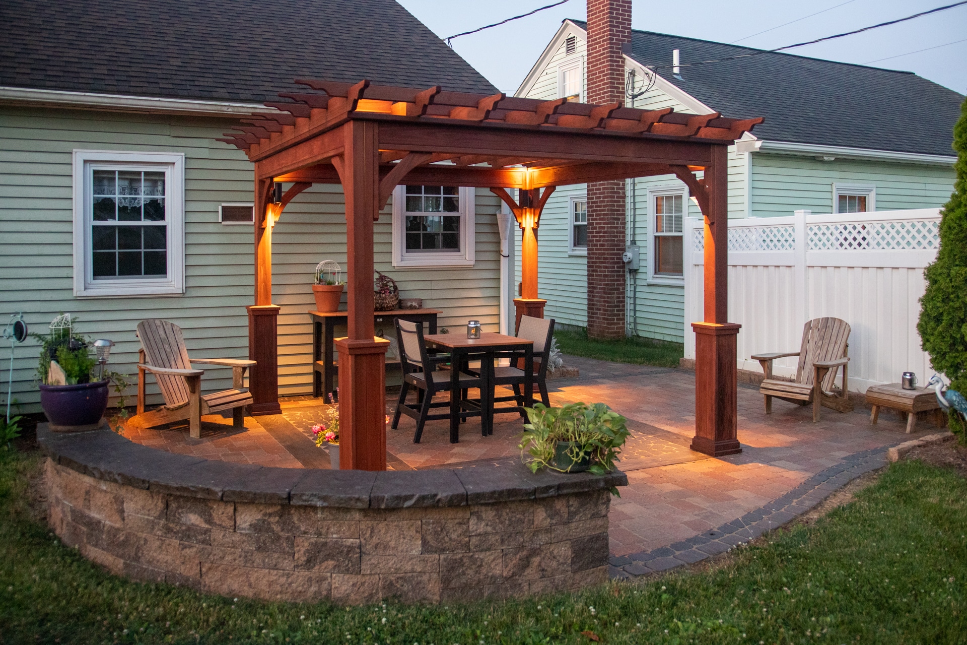 Concrete patio with wooden pergola in Virginia - Custom patio Builders near me