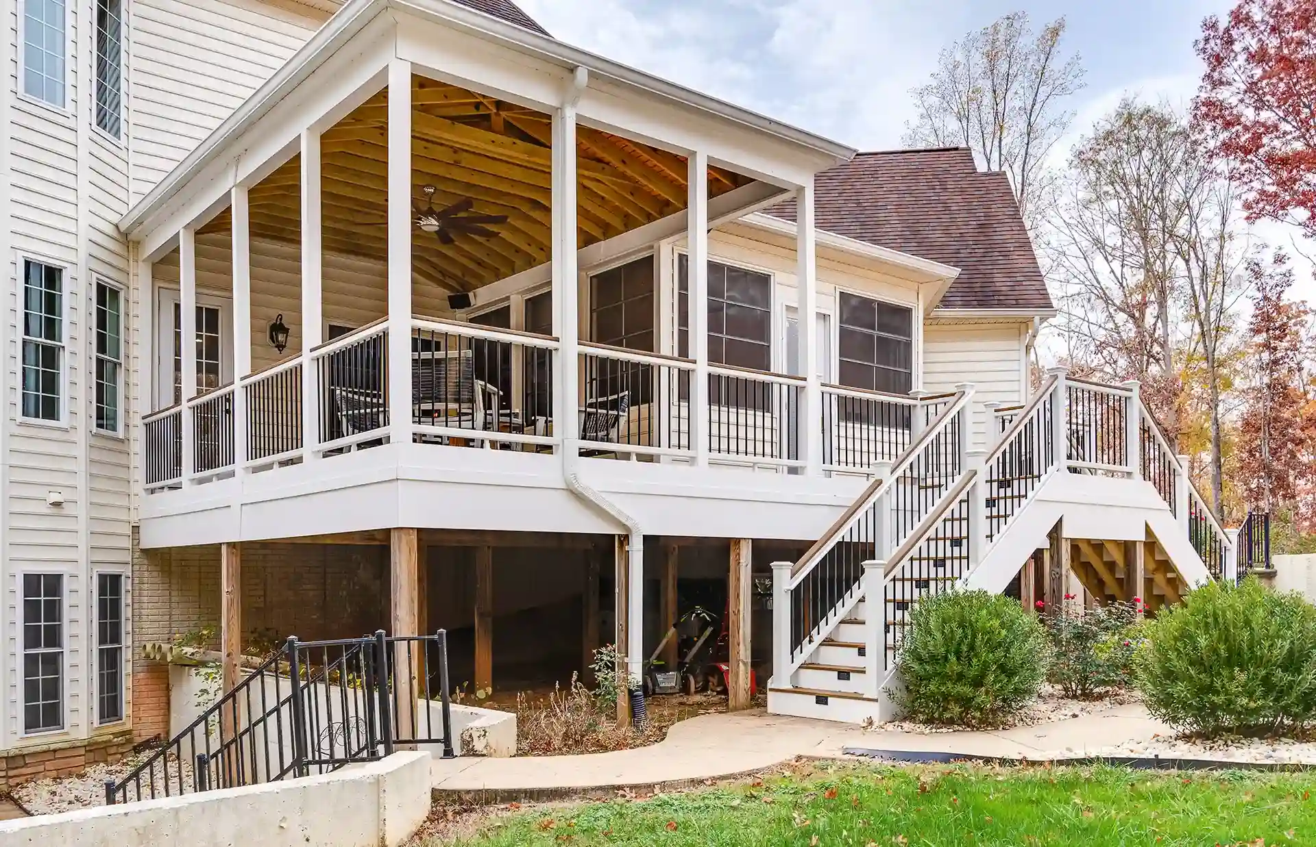 photo of an elevated deck with room below for storing lawn equipment