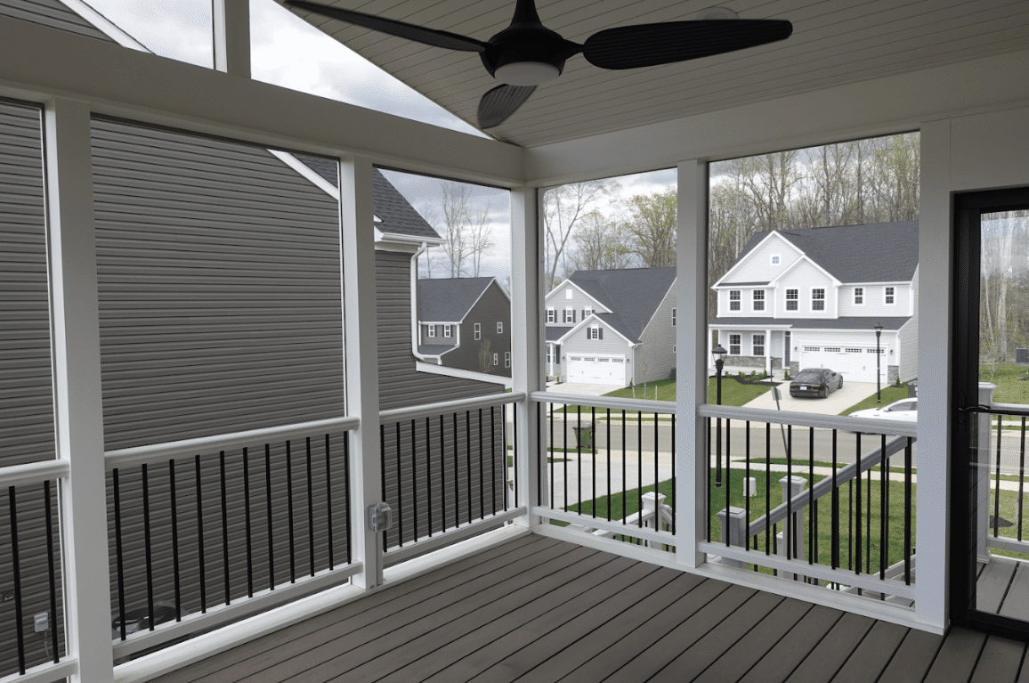 Elevated deck with a tradition pergola and patio below - Custom deck builders near me