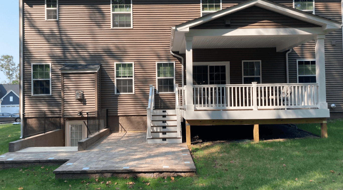 stone pavers to augment a covered deck - Stone pavers installation in Virginia - Outdoor Living Contractor and Patio builders near me Virginia