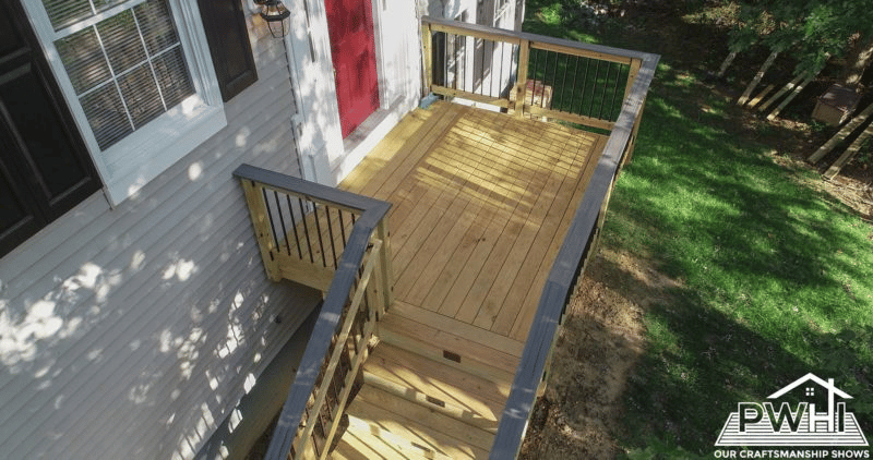 A wooden deck installed by PWHI deck builders in Fairfax, Virginia.