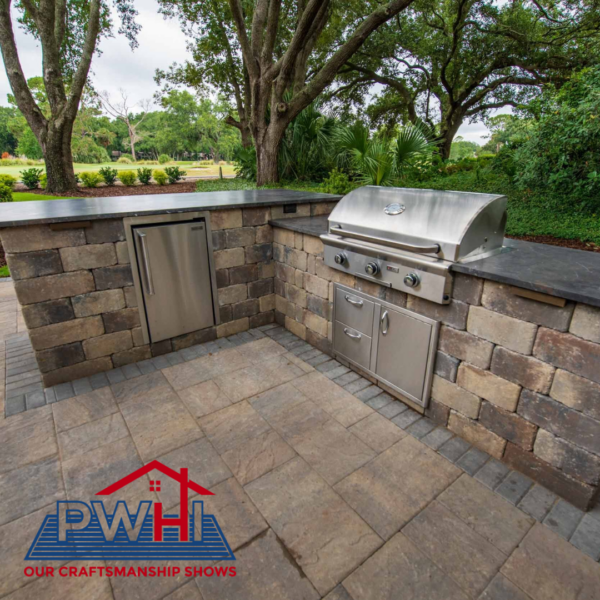 New outdoor kitchen with granite countertops and a dining area for year round inspiration 