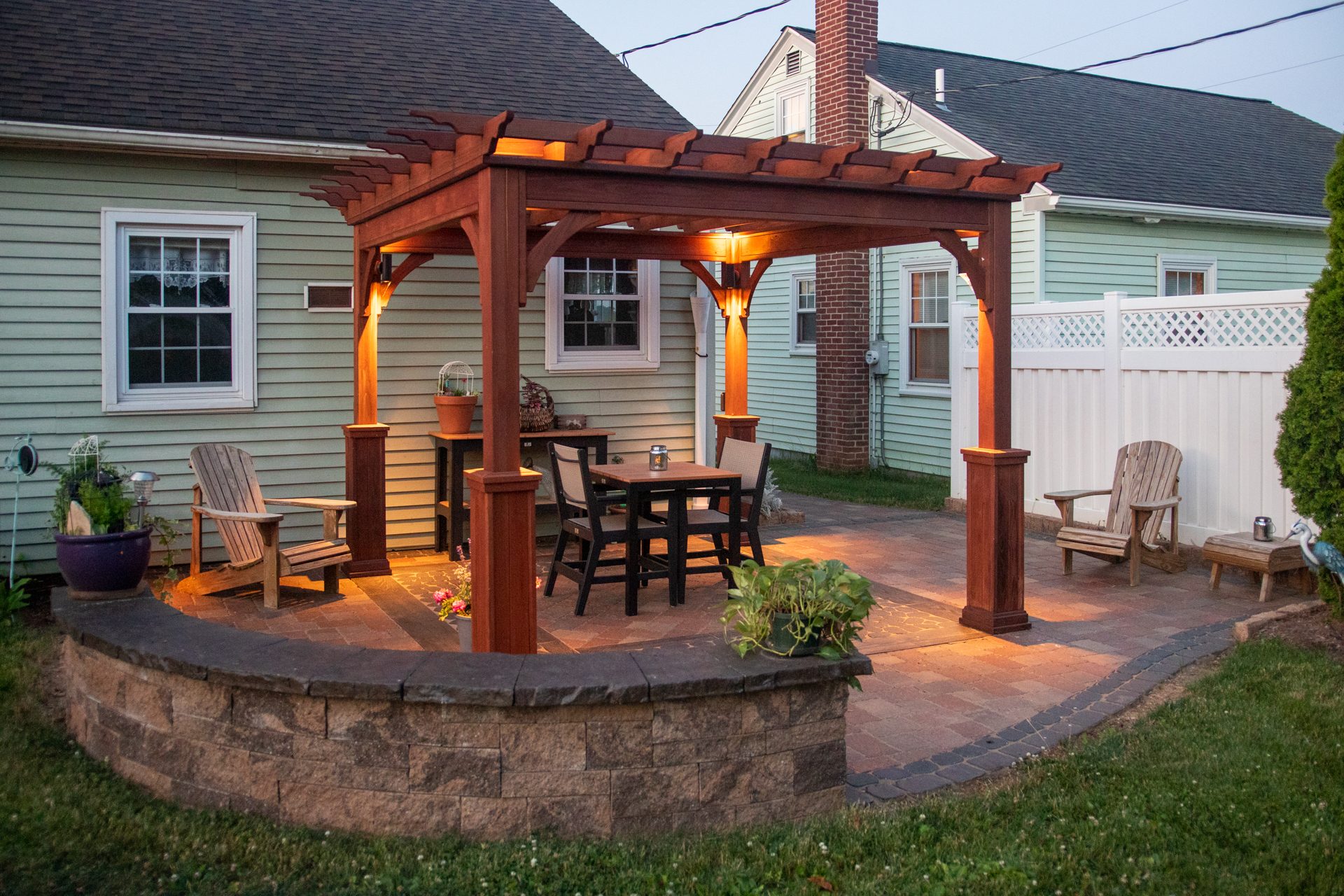 Elegant outdoor space with a pergola and paver patio.