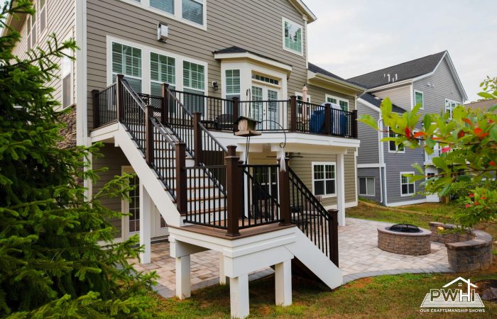 Elevated Composite Deck with Paver Patio and Fire Pit